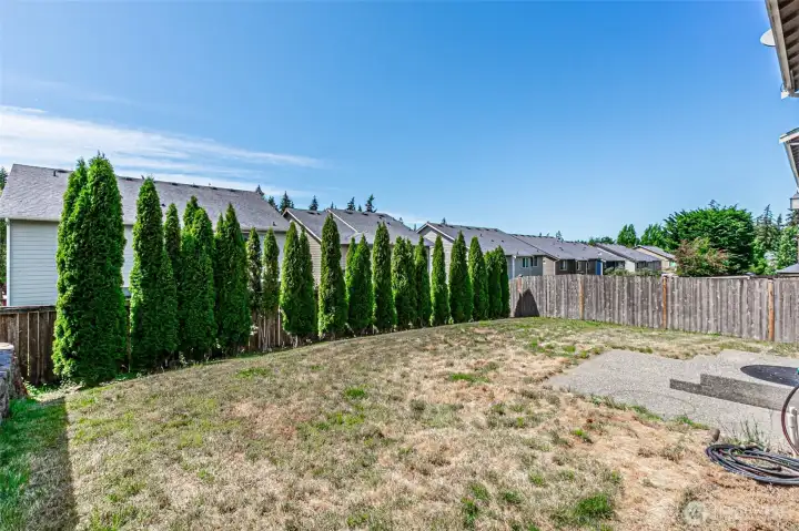 Fully fenced level backyard