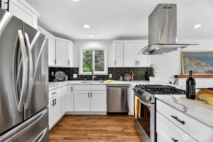 Large Kitchen with Lots of Counter Space and Stainless Steel Appliances Large Kitchen with Lots of Counter Space and Stainless Steel Appliances