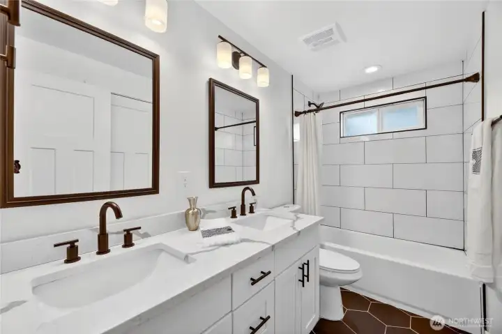 Stylish Dual-Vanity Bath with Direct Bedroom Access Stylish Dual-Vanity Bath with Direct Bedroom Access