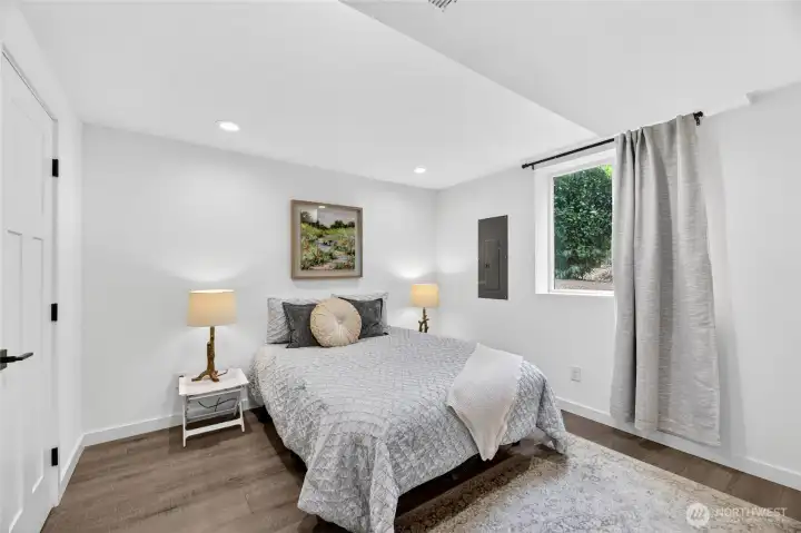 Spacious Lower-Level Bedroom with Natural Light Spacious Lower-Level Bedroom with Natural Light