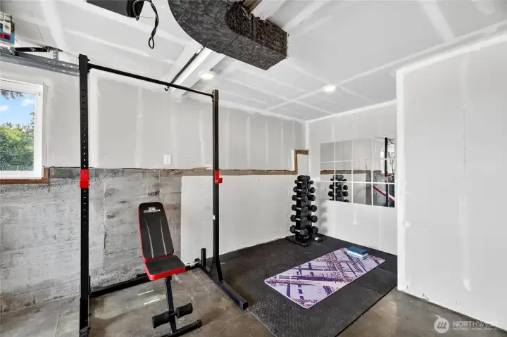 Garage with Flexible Storage & Fitness Space Garage with Flexible Storage & Fitness Space