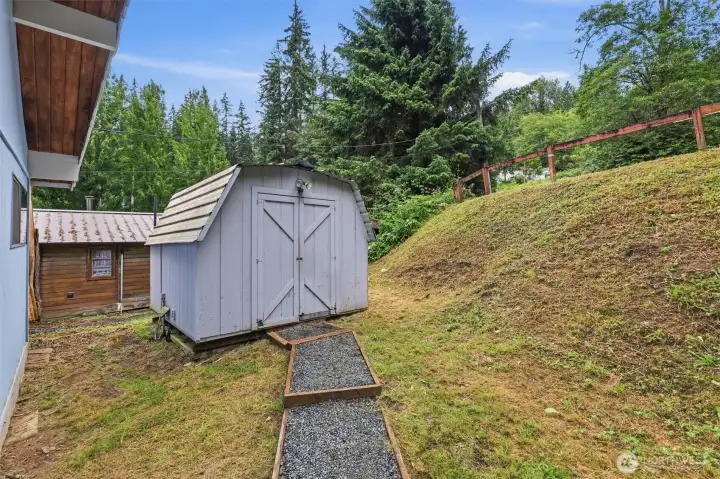 Laundry shed with space for storage.