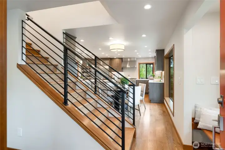 Greeted in the entry by a stunning staircase and built-in bench overlooking lovely territorial and lake views. Greeted in the entry by a stunning staircase and built-in bench overlooking lovely territorial and lake views.