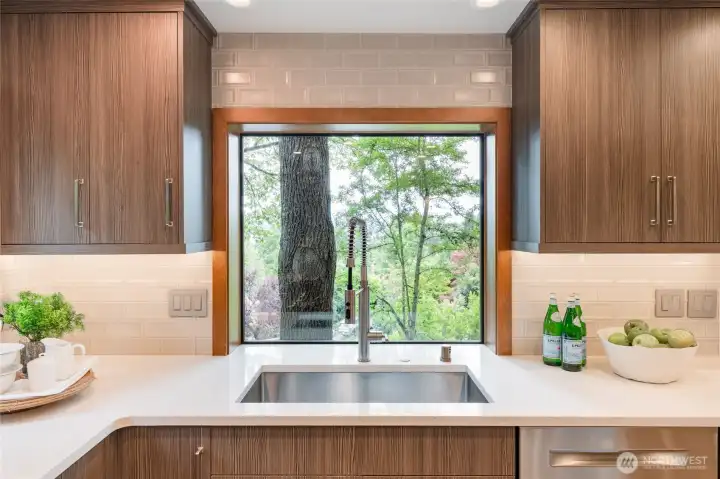 Under-cabinet lighting, one of two sinks, and a peaceful view... Under-cabinet lighting, one of two sinks, and a peaceful view...
