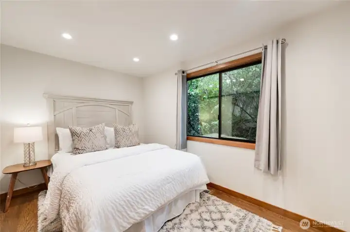 The main floor guest bedroom. The main floor guest bedroom.