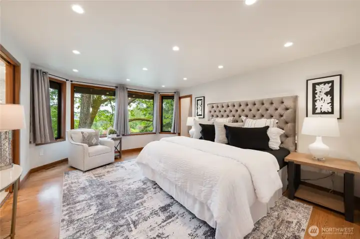With territorial and peek a boo lake views, a spacious walk-in closet and gorgeous bathroom, the primary suite is a true retreat. With territorial and peek a boo lake views, a spacious walk-in closet and gorgeous bathroom, the primary suite is a true retreat.