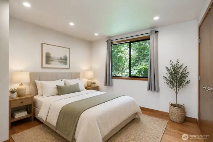 One of the two additional bedrooms on the upper level. Virtually staged! One of the two additional bedrooms on the upper level. Virtually staged!