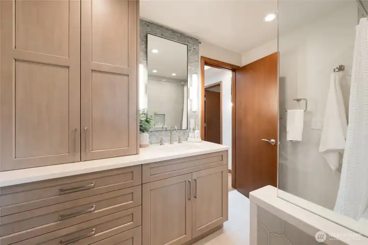 Floor to ceiling storage with outlets built in. Floor to ceiling storage with outlets built in.