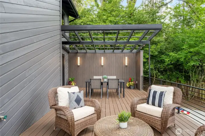 The outdoor dining area features gorgeous outdoor lighting. The outdoor dining area features gorgeous outdoor lighting.