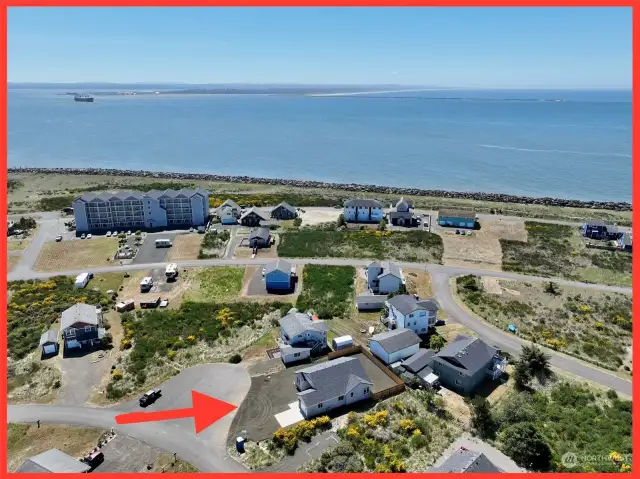 Located 2 streets in from the North jetty wall! Look how close to the water you will be!