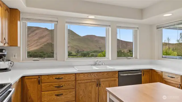 Your view while in the kitchen, may just be the best in the whole house.  Your time spent cooking and creating meals will be that much more enjoyable with a view like this.