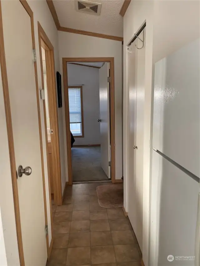 Large pantry to the left and utility closet to the right