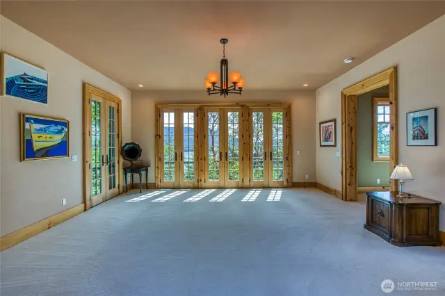 Great Room with numerous French doors to exteriors.