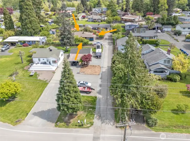 Paved private driveway shared with the rear neighbor, providing easy and quiet access.