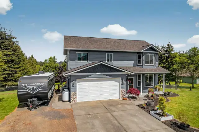Front of House With RV Storage