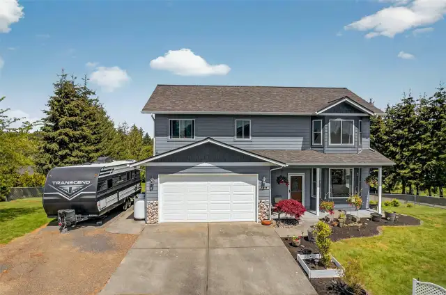 Front of House With RV Storage