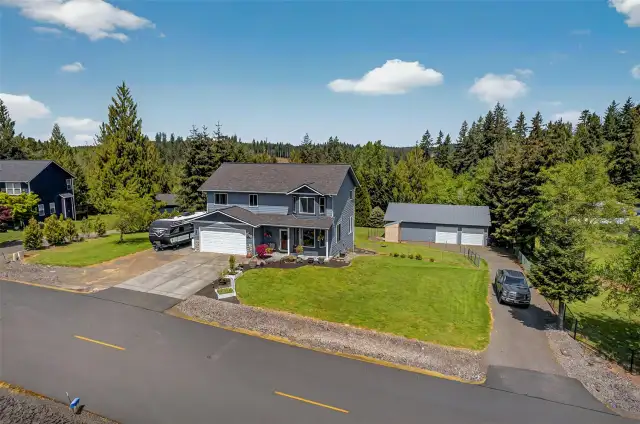 Front of House With RV Storage and Shop