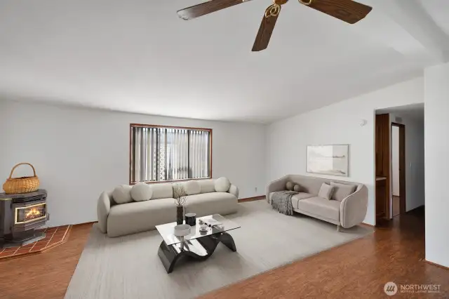 Another view of the large living room area. This room will easily accommodate, sofa, love seat, recliners, Big Screen TV and more.