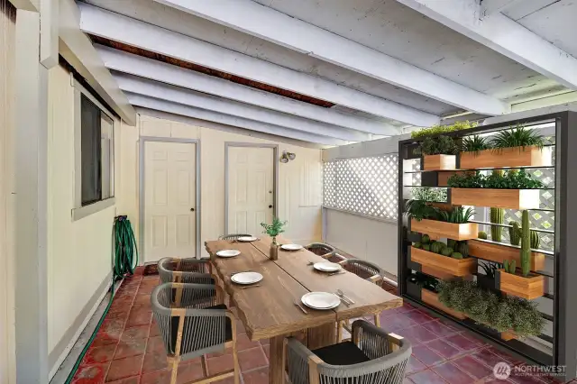 Covered patio/ carport area. Easy care tile floor. Room for all outdoor furniture, barbeques. Sit out here, enjoy your morning coffee/ tea and listen to the birds etc.