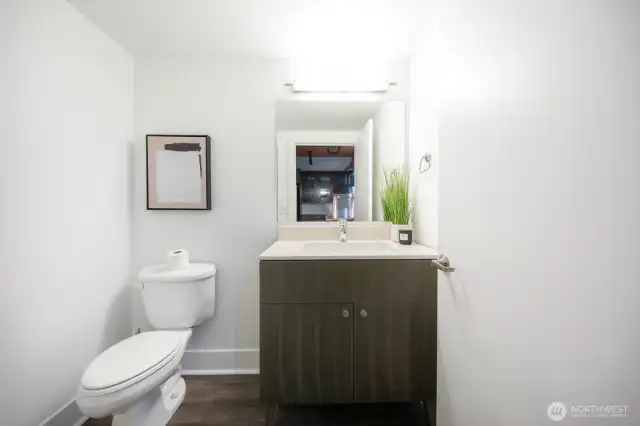 Main level powder bath, convenient for guests.
