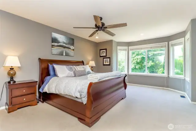 Large Primary bedroom with huge bay window for space and light.