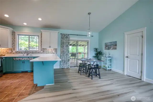 Dining area leads to covered back deck