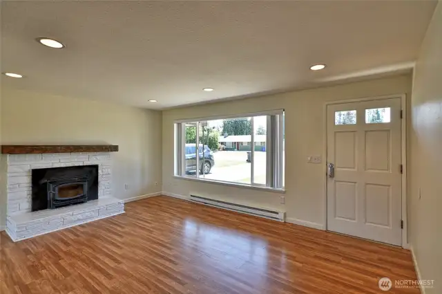 Spacious living room with fireplace insert
