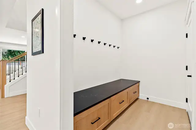 Mudroom off of garage with storage.