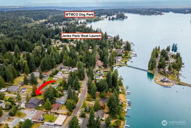 Proximity waterfront dog park and to Jenks Park with boat launch, playground, lake access, pickle ball, tennis and sports courts.