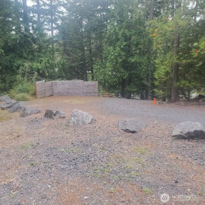 View from upper side of lot looking toward driveway entry.