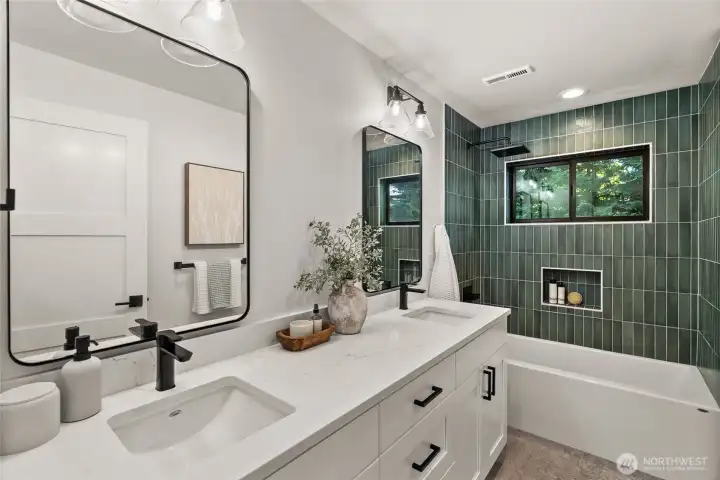 Bathroom serves 3 bedrooms on this level.