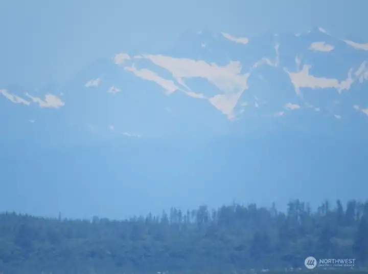 VISABLE TO THE NORTH OF THE HOME IS THE MAJESTIC OLYMPIC MOUNTAINS!