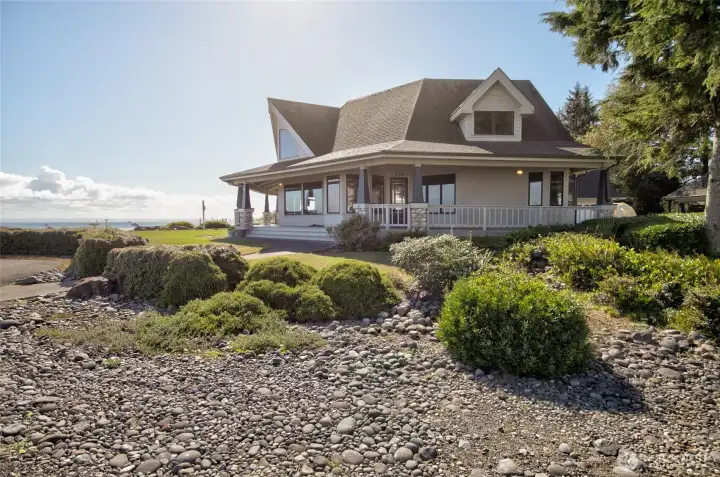 CAPTAIN GREY CT VIEW OF THE HOME SHOWING THE LANDSCAPING AND BAY IN THE BACKGROUND!
