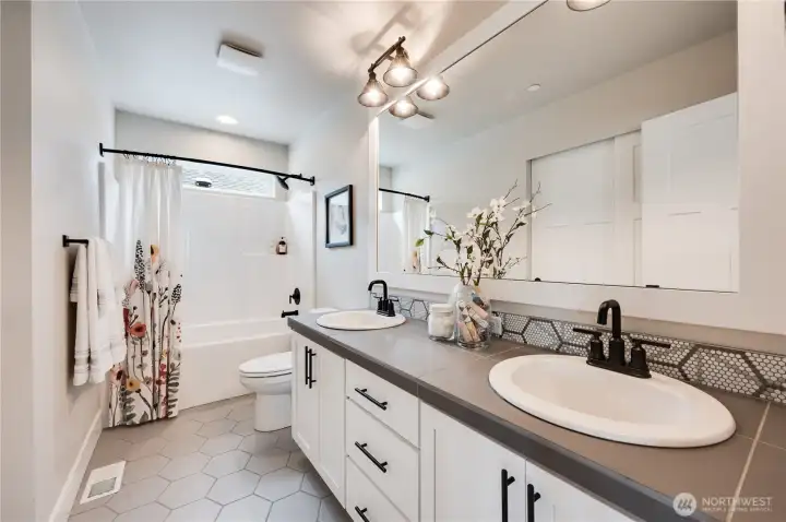 Photos of Model Home of Plan 2473 Elevation B at another community.  Details and colors will vary from home to home. No two homes are exact. Ask Broker for color selections for the listed property