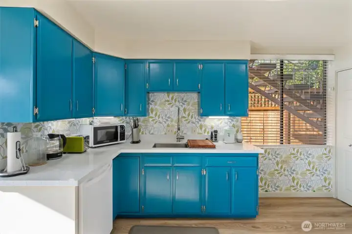 Unit #2 kitchen with quartz counters.