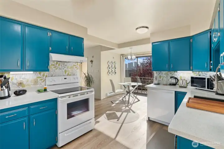 Spacious kitchen with eat-in dining in addition to separate full dining table.