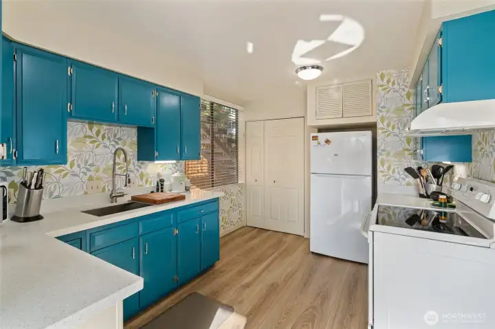 The kitchen has 2 separate pantry spaces  for plenty of storage.