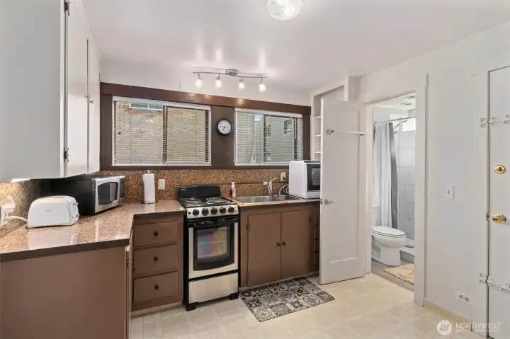 Ground floor kitchen with lots of space to move around. Private access/entrance to back patio.