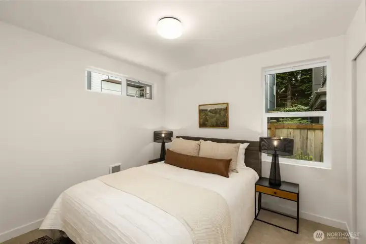 One of two ample bedrooms on the first level.