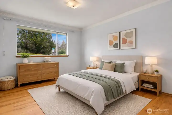 Guest bedroom on the main floor. Virtually staged.
