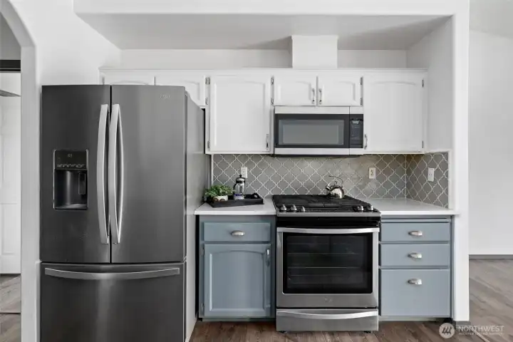 Stainless steel appliances and gas stove.