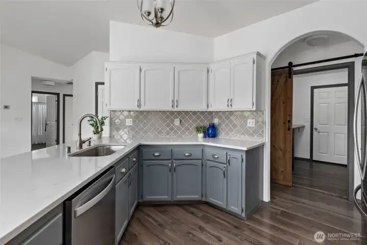 Do the dishes while still part of the conversation in the living or dining room.