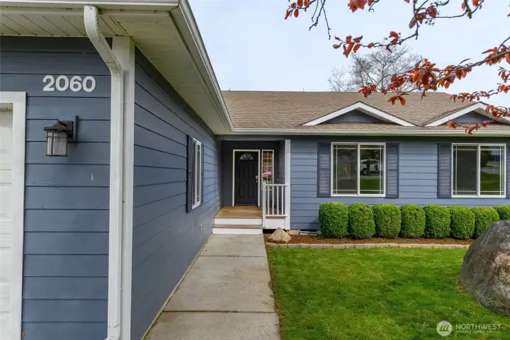 Sidewalk from driveway to front door.