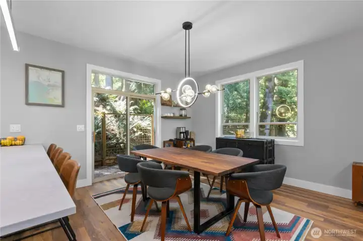 Entertain and gather in this bright dining room with patio access.