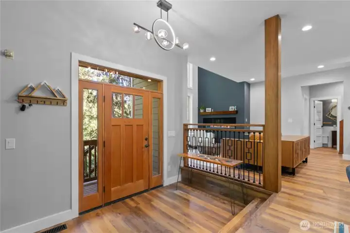Custom railings and lighting bring a sleek and modern look to this PNW retreat.