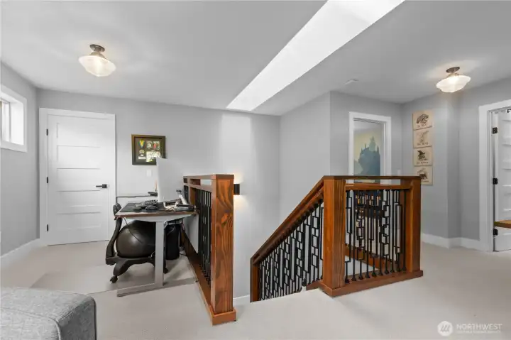 Head upstairs and admire the custom railing and ballusters.