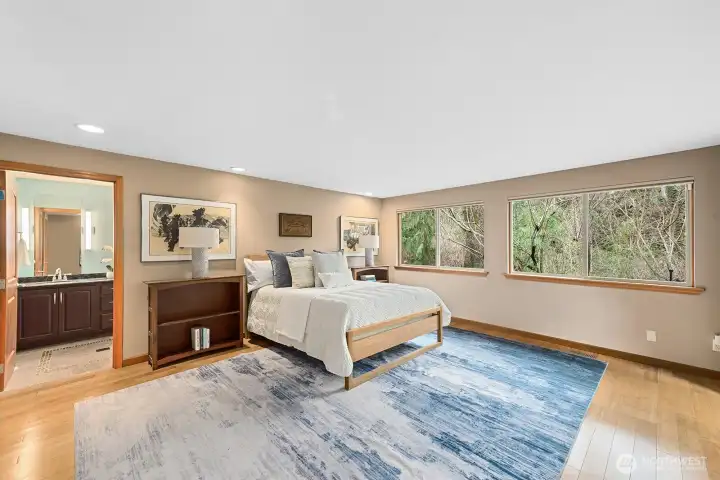 The large, light-filled primary suite is a retreat unto itself.