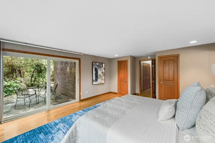 The primary suite opens to its own private patio.