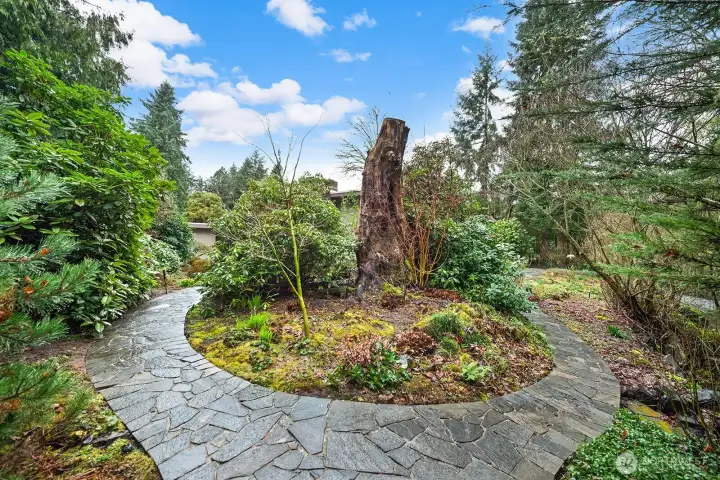 While the landscaping has been winterized, it will soon "spring" to life with native blooms of every color, shape, & size lasting through the fall.