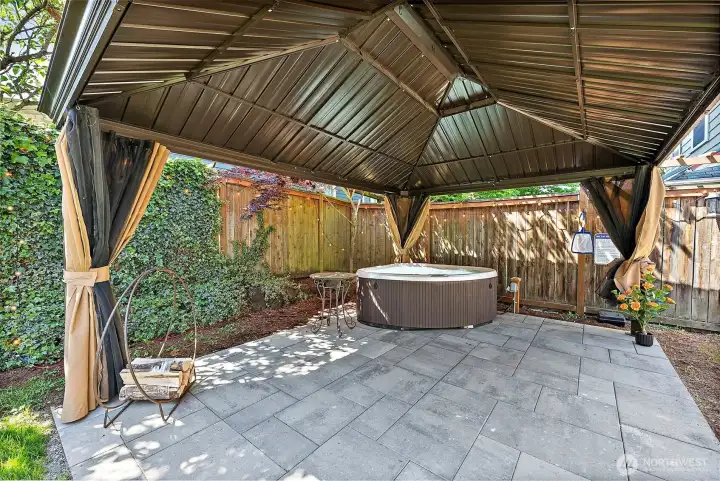 Covered Area Featuring a Hot Tub Covered Area Featuring a Hot Tub